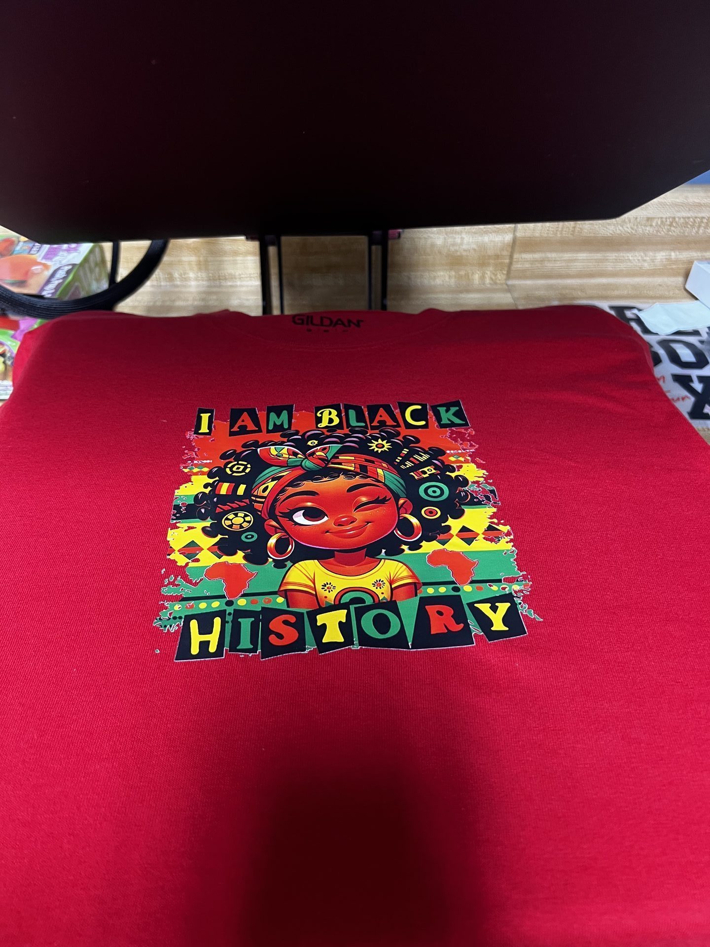 Custom red shirt with I Am Black History bold graphic design