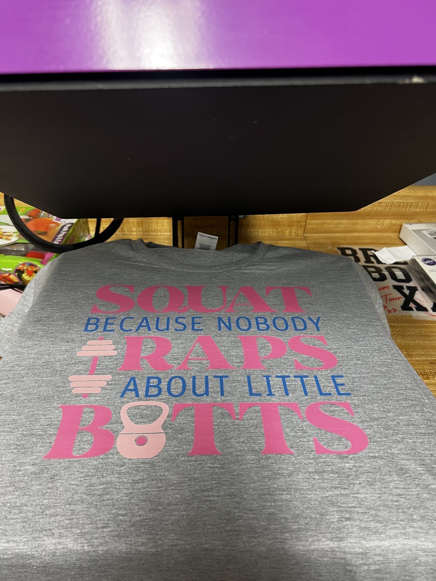 Custom gray fitness graphic shirt with pink and blue typography