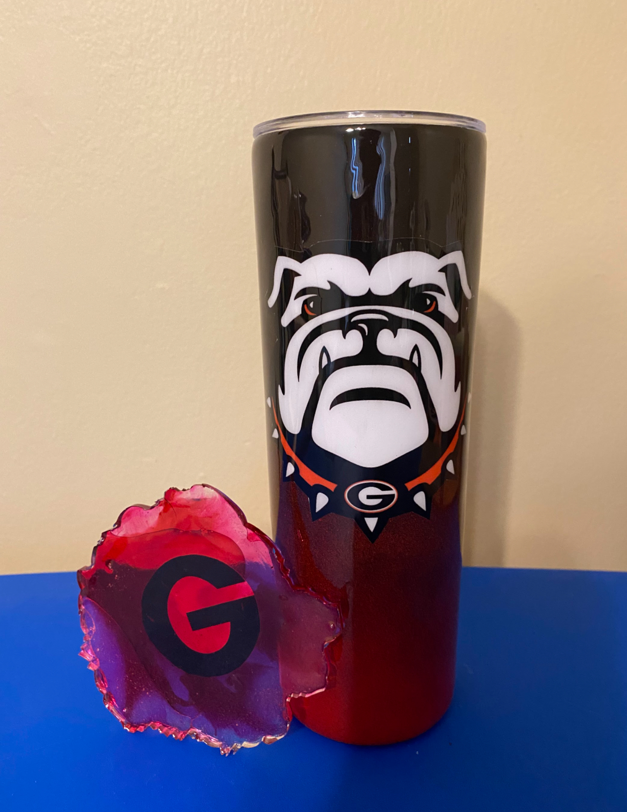 Custom designed tumbler with bulldog artwork and coaster